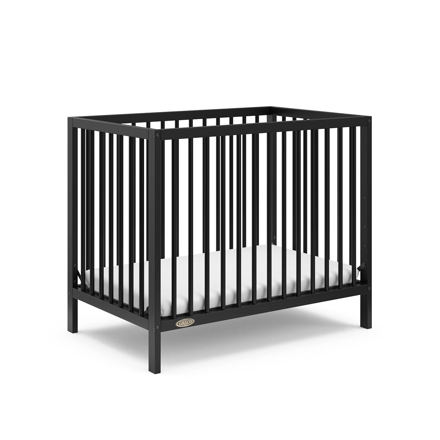 imageGraco Teddi 4in1 Convertible Mini Crib with Bonus WaterResistant Mattress Driftwood GREENGUARD Gold Certified 275Inch Mattress Included Ideal for Small Spaces Easy 30Minute AssemblyBlack