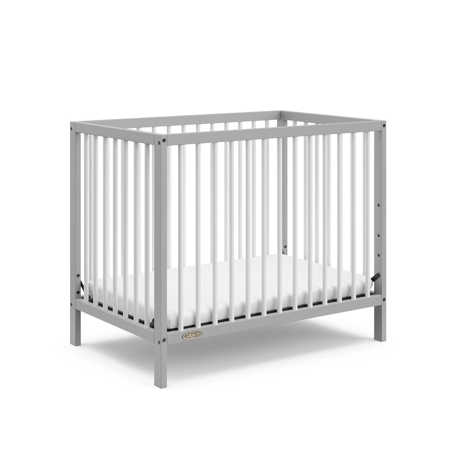 imageGraco Teddi 4in1 Convertible Mini Crib with Bonus WaterResistant Mattress Driftwood GREENGUARD Gold Certified 275Inch Mattress Included Ideal for Small Spaces Easy 30Minute AssemblyPebble GrayWhite