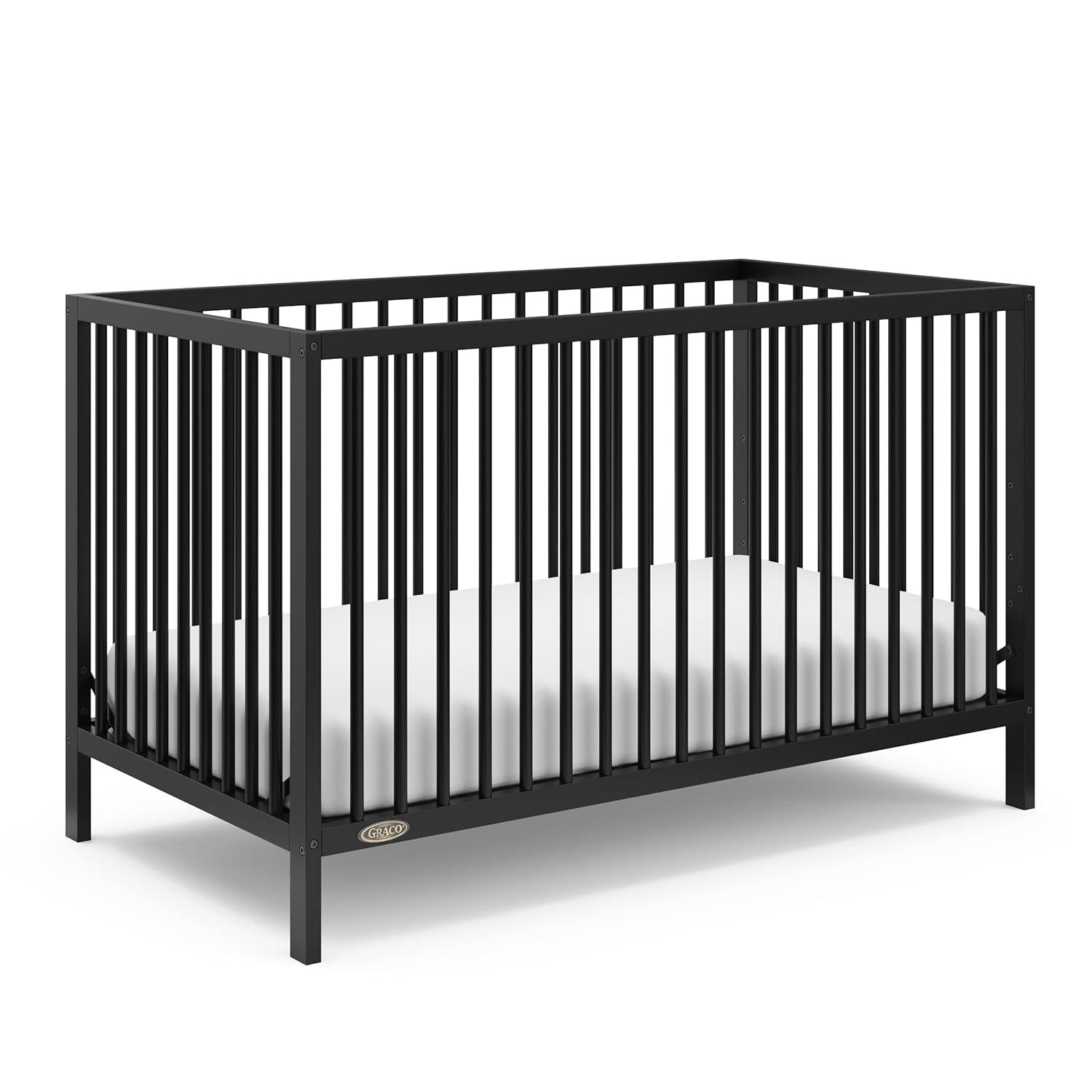 imageGraco Teddi 4in1 Convertible Mini Crib with Bonus WaterResistant Mattress Driftwood GREENGUARD Gold Certified 275Inch Mattress Included Ideal for Small Spaces Easy 30Minute AssemblyBlack