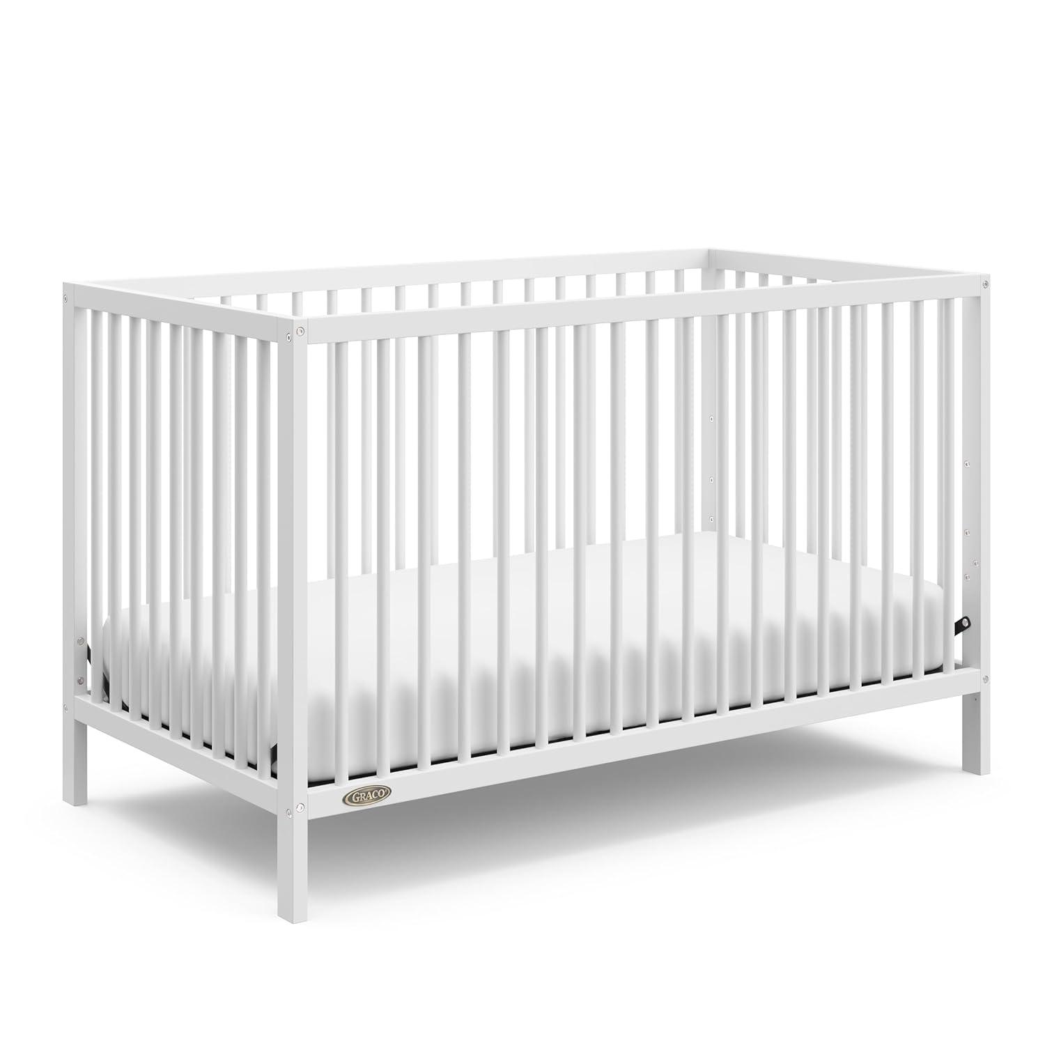 imageGraco Teddi 4in1 Convertible Mini Crib with Bonus WaterResistant Mattress Driftwood GREENGUARD Gold Certified 275Inch Mattress Included Ideal for Small Spaces Easy 30Minute AssemblyWhite