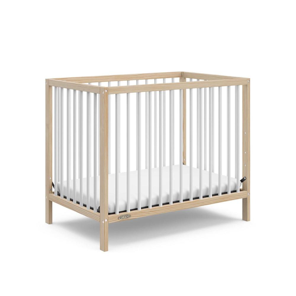 imageGraco Teddi 4in1 Convertible Mini Crib with Bonus WaterResistant Mattress Driftwood GREENGUARD Gold Certified 275Inch Mattress Included Ideal for Small Spaces Easy 30Minute AssemblyNaturalWhite