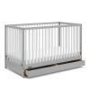 imageGraco Teddi 4in1 Convertible Mini Crib with Bonus WaterResistant Mattress Driftwood  GREENGUARD Gold Certified 275Inch Mattress Included Ideal for Small Spaces Easy 30Minute AssemblyPebble GrayWhite