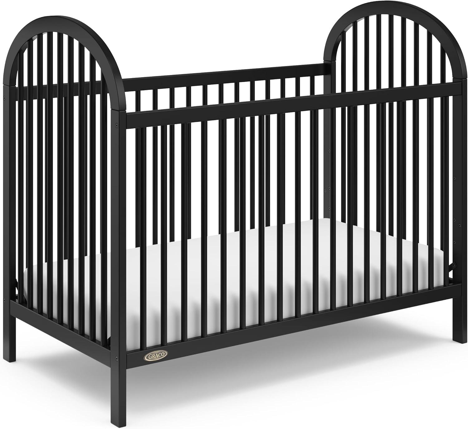 imageGraco Olivia Convertible Crib Black GREENGUARD Gold Certified 100 Solid Wood Fits Standard Crib Mattress Converts to Toddler Bed and Daybed 4 Adjustable Mattress HeightsBlack