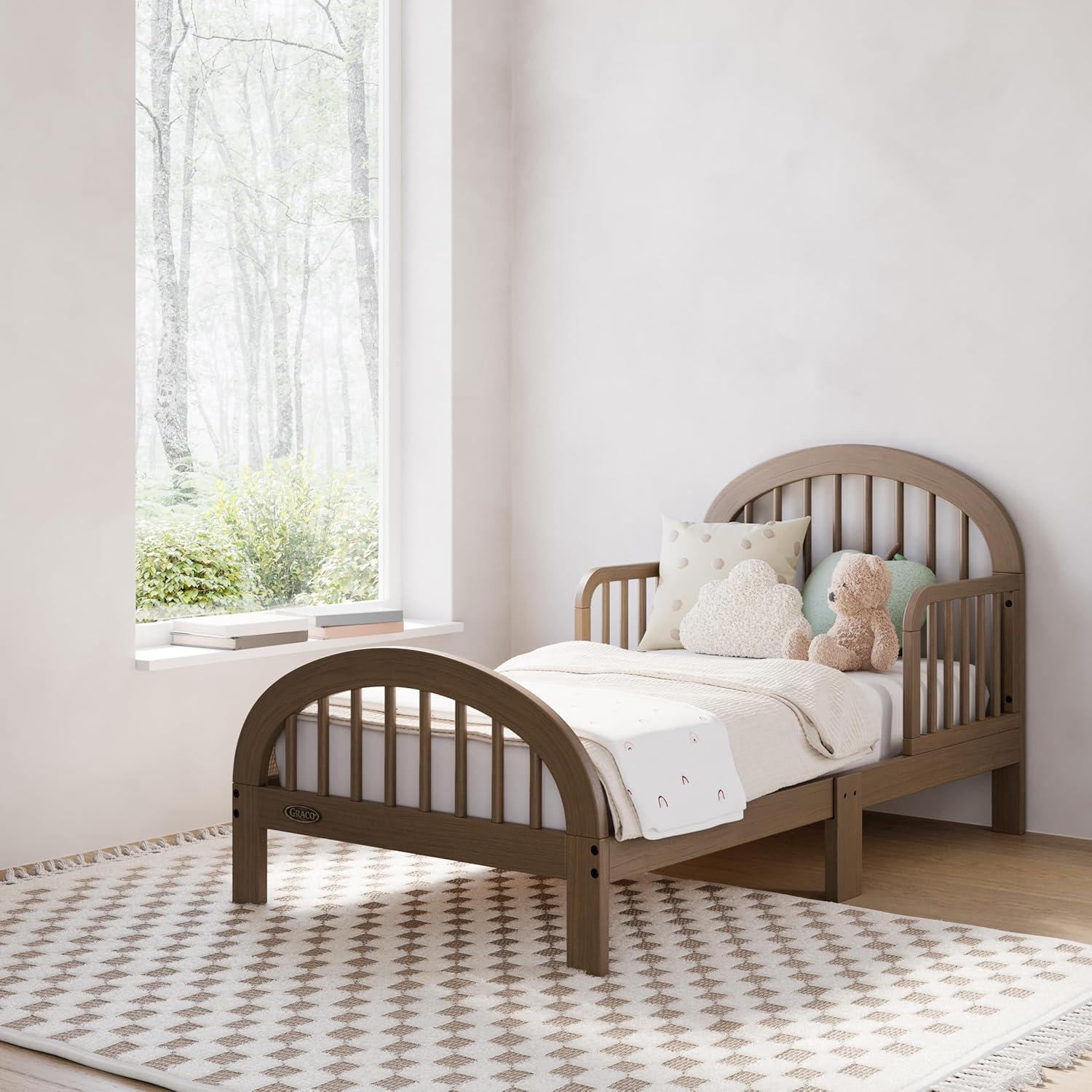 imageGraco Olivia Toddler Bed Driftwood GREENGUARD Gold Certified Includes Toddler Safety Guardrails Fits Standard Crib amp Toddler Mattress Stylish Arched DesignHazelnut