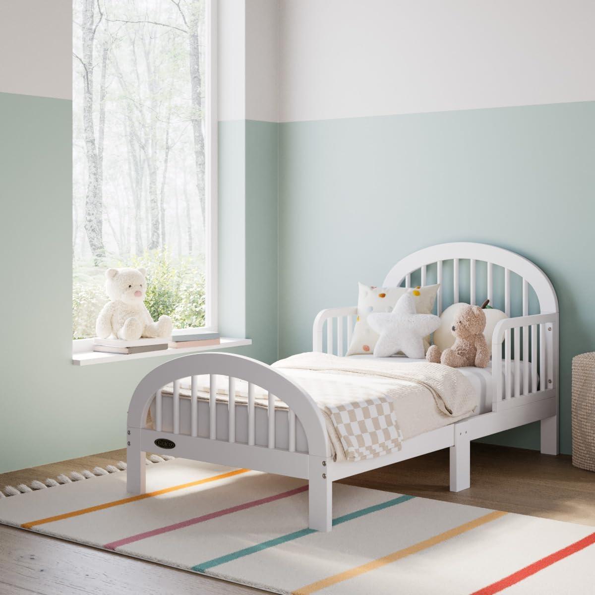 imageGraco Olivia Toddler Bed Driftwood GREENGUARD Gold Certified Includes Toddler Safety Guardrails Fits Standard Crib amp Toddler Mattress Stylish Arched DesignWhite