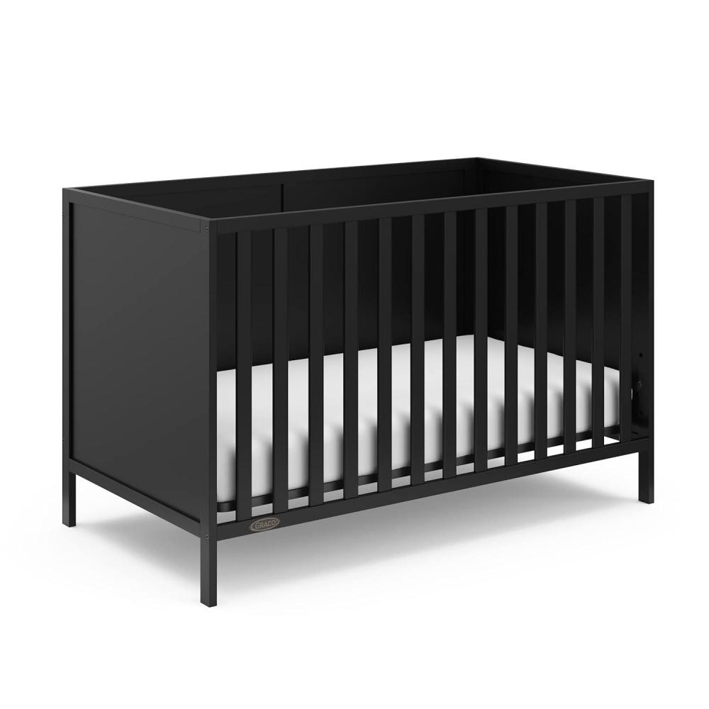 imageGraco Theo Convertible Crib with Storage Drawer Frosted Oat  GREENGUARD Gold Certified Wooden Baby Crib with Drawer Converts to Toddler Bed Fits Standard Crib MattressBlack