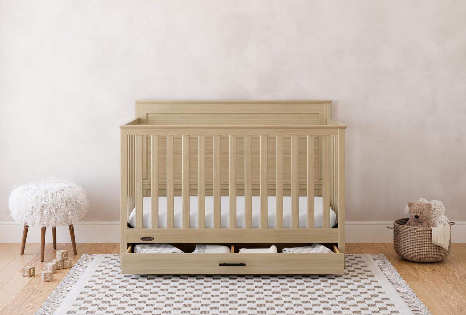 imageGraco Tristan 5in1 Convertible Crib with Drawer Frosted Oat GREENGUARD Gold Certified Fits Standard Crib Mattress Premium Handle Converts to Toddler Bed Daybed and FullSize BedDriftwood