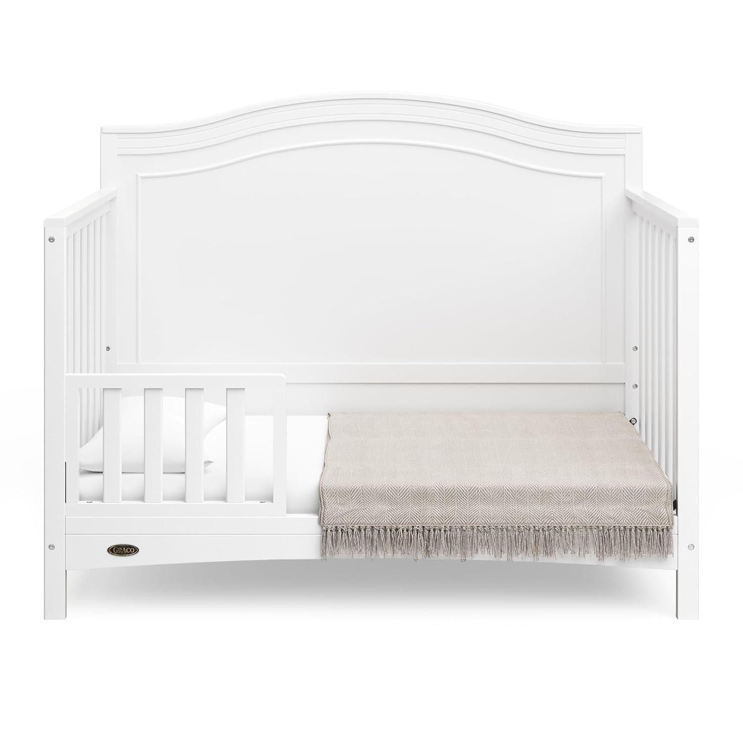 imageGraco Paris 4in1 Convertible Crib GREENGUARD Gold Certified Converts to Toddler Bed and Daybed Fits Standard FullSize Crib Mattress Adjustable Mattress Support Base Frosted OatWhite